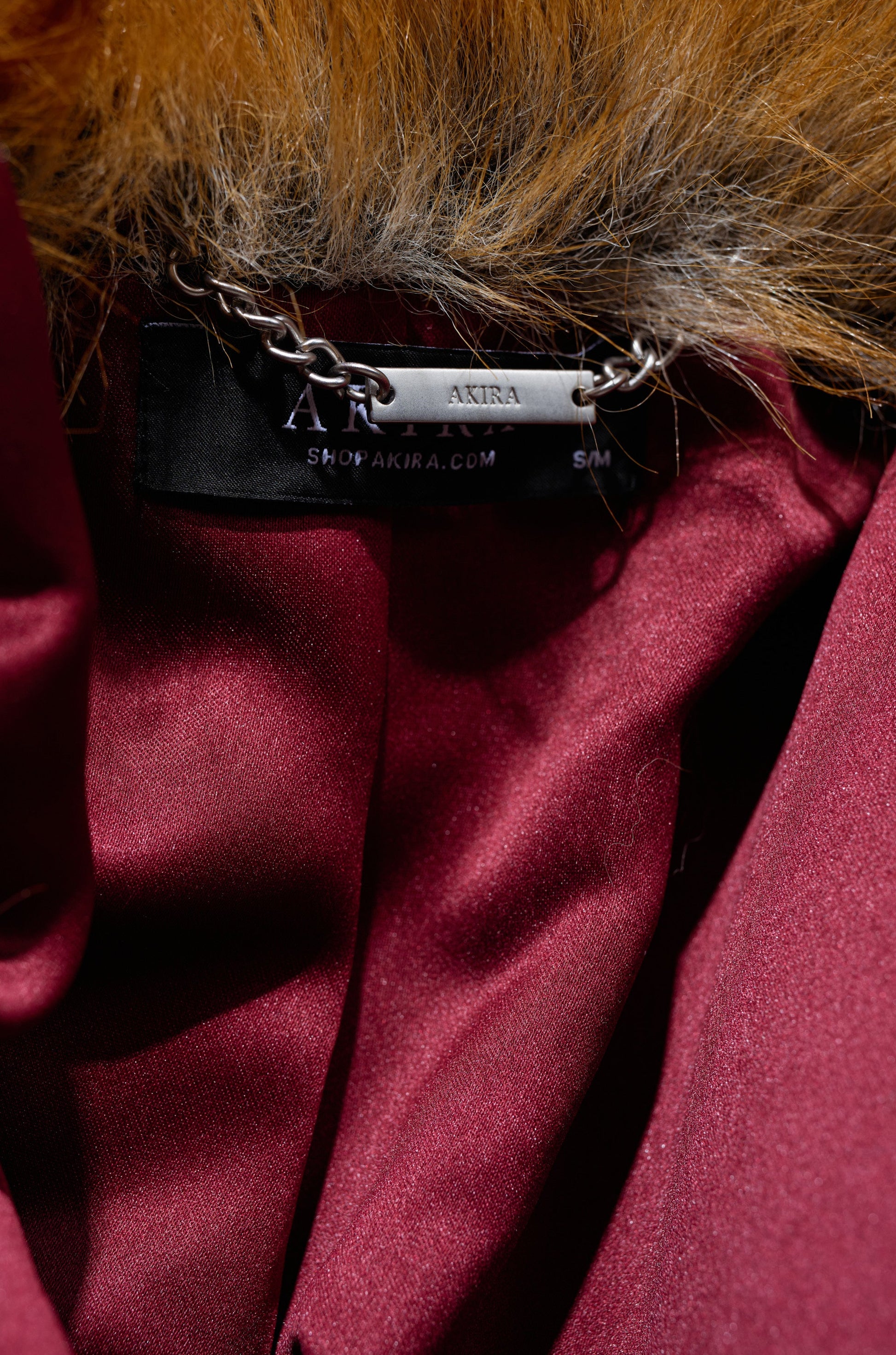 ALAIA STRIPED FAUX FUR